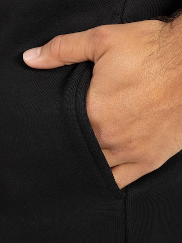 Regular Pantalon de sport ' Chaise ' Smilodox en noir