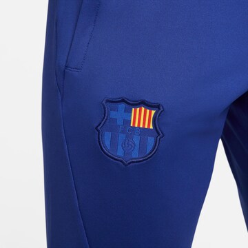 Skinny Pantalon de sport 'Strike' NIKE en bleu