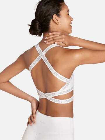 Bustino Reggiseno sportivo 'Joy' di OCEANSAPART in bianco