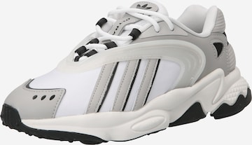 Baskets basses 'Oztral' ADIDAS ORIGINALS en blanc : devant