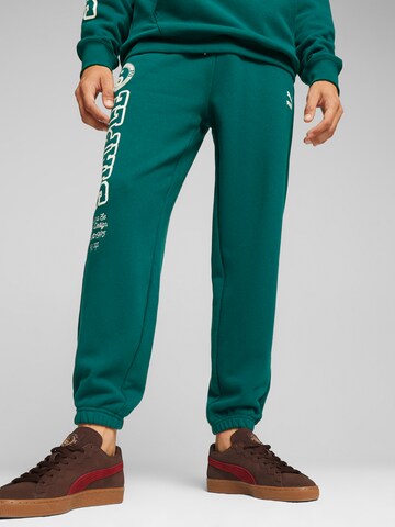 PUMA Zúžený Kalhoty 'PUMA X STAPLE' – zelená: přední strana