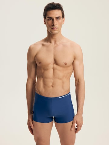 Pantaloncini da bagno di Henderson in blu: frontale