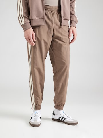 Tapered Pantaloni 'Adicolor Firebird' di ADIDAS ORIGINALS in verde: frontale