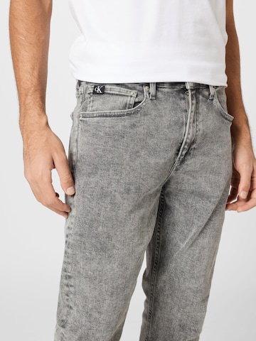 Calvin Klein Jeans - Slimfit Calças de ganga em cinzento