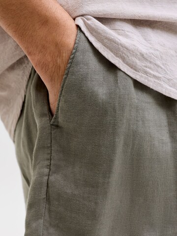 JACK & JONES Wide Leg Lærredsbukser 'JPSTBill JJLawrence' i grøn