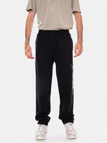 DOLLY NOIRE Luźne Spodnie 'SHARD BAGGY SWEATPANTS BLACK' w kolorze czarny