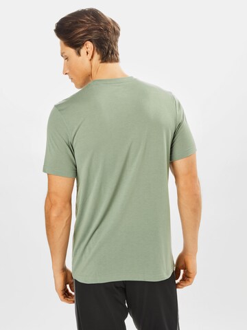 Reebok - Camiseta funcional en verde