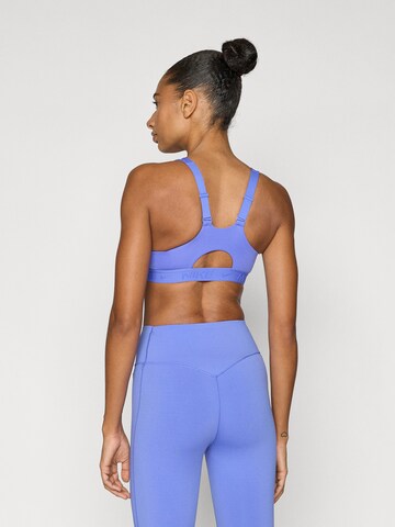 NIKE - Bustier Sujetador deportivo 'INDY' en azul