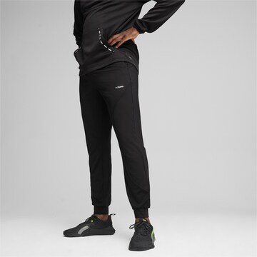 PUMA Tapered Workout Pants in Black: front