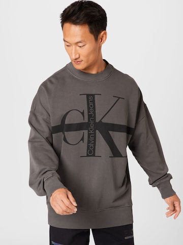 Calvin Klein Jeans Sweatshirt in Grijs: voorkant