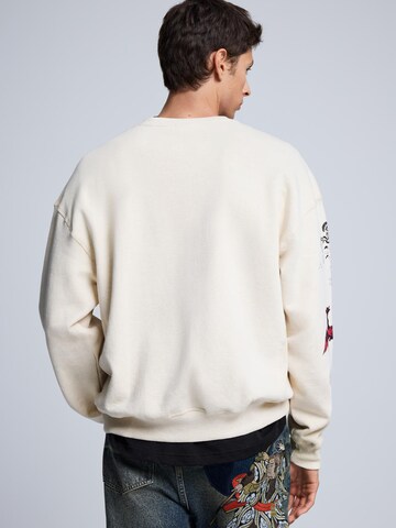 Sweat-shirt Desigual en blanc