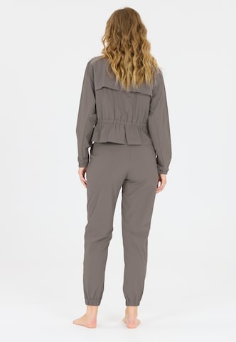 Athlecia Tapered Sporthose 'Hero' in Braun