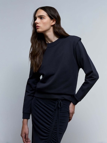 ScalpersSweater majica - crna boja: prednji dio