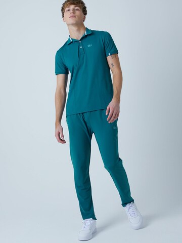 T-Shirt fonctionnel 'Polo' SPORTKIND en vert