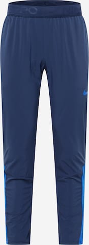 Pantalon de sport NIKE en bleu : devant