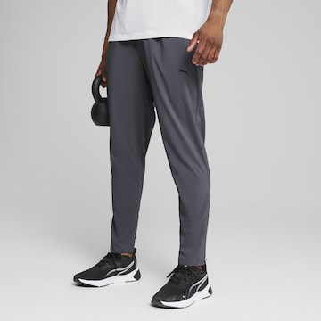PUMA Tapered Sportbroek 'TAD Essentials' in Grijs