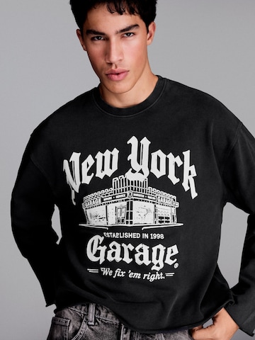 Sweat-shirt Bershka en noir : devant