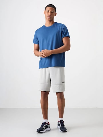 T-Shirt fonctionnel Tommy Life en bleu