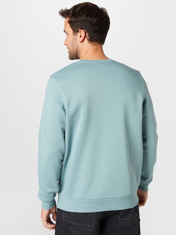 UNDER ARMOUR Athletic Sweatshirt in Green