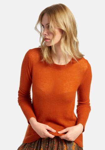 Pull-over include en orange : devant