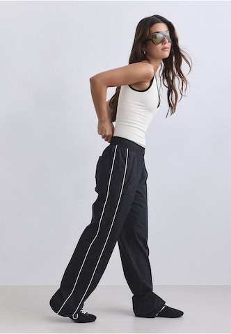 Loosefit Pantaloni sportivi 'Balance' di Aim'n in nero