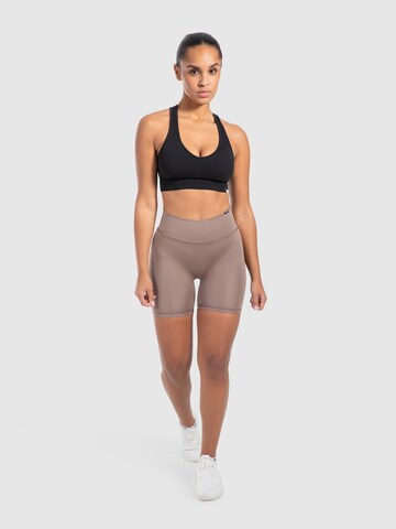 Skinny Pantalon de sport Smilodox en marron