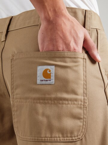 Loosefit Pantaloni di Carhartt WIP in marrone