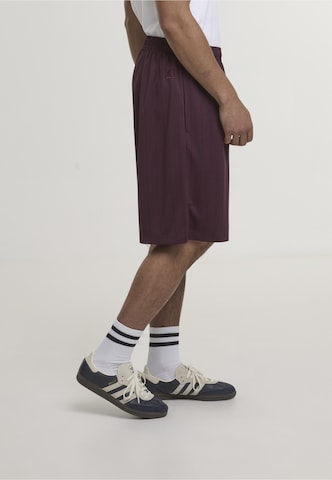 Karl Kani Loosefit Shorts in Rot