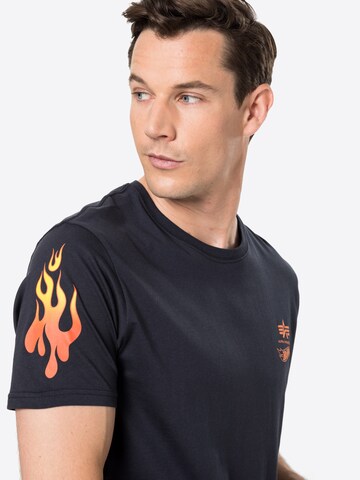ALPHA INDUSTRIES T-shirt 'Flame' i blå
