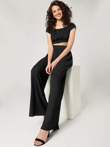 Guido Maria Kretschmer Women Wide leg Trousers 'TAMARA' in Black