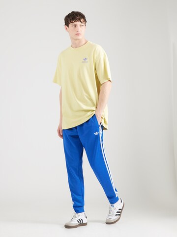 Effilé Pantalon ADIDAS ORIGINALS en bleu