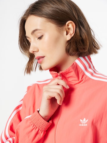 ADIDAS ORIGINALS Prechodná bunda - Červená