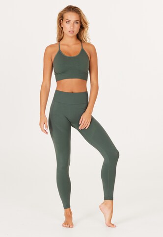 Skinny Pantaloni sportivi 'NAGAR' di Athlecia in grigio