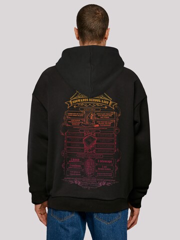 F4NT4STIC Sweatshirt 'Harry Potter Hogwarts School' in Zwart