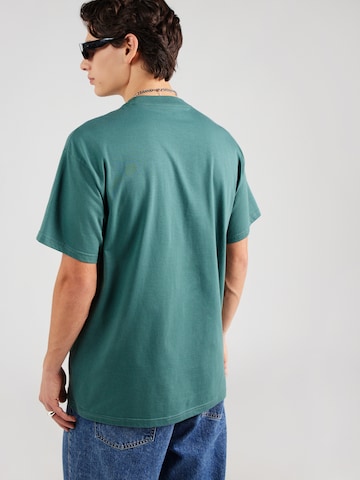 T-Shirt 'Experiential' Carhartt WIP en vert
