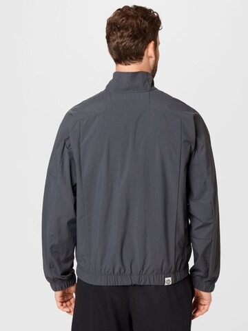 Nike Sportswear Between-season jacket in Grey