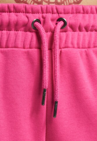 Karl Kani Regular Sporthose in Pink