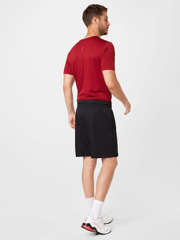 PUMA Regular Sportshorts in Schwarz