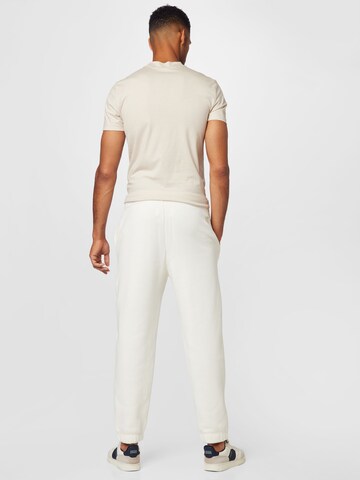 Tapered Pantaloni de la Champion Authentic Athletic Apparel pe alb