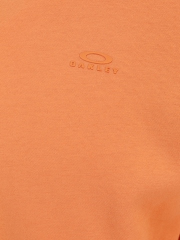 OAKLEY Sportsweatshirt in Oranje