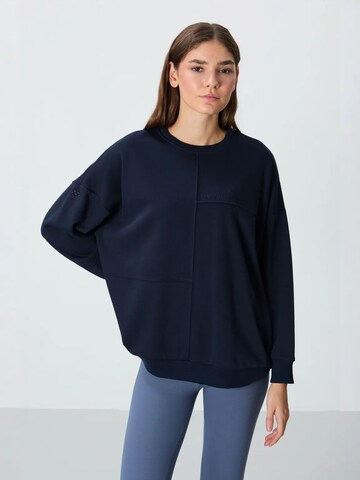 Sweat-shirt Tommy Life en bleu