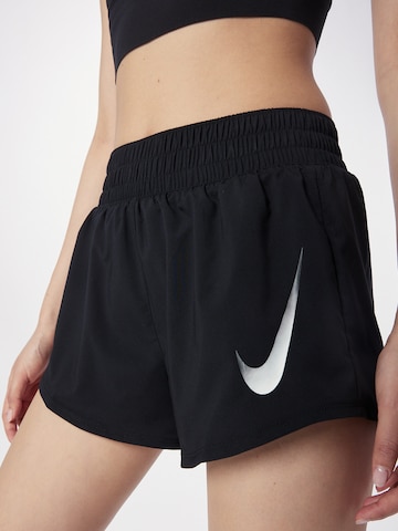 NIKE Loose fit Workout Pants 'Swoosh' in Black