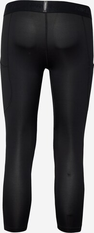 NIKE - Skinny Pantalón deportivo en negro