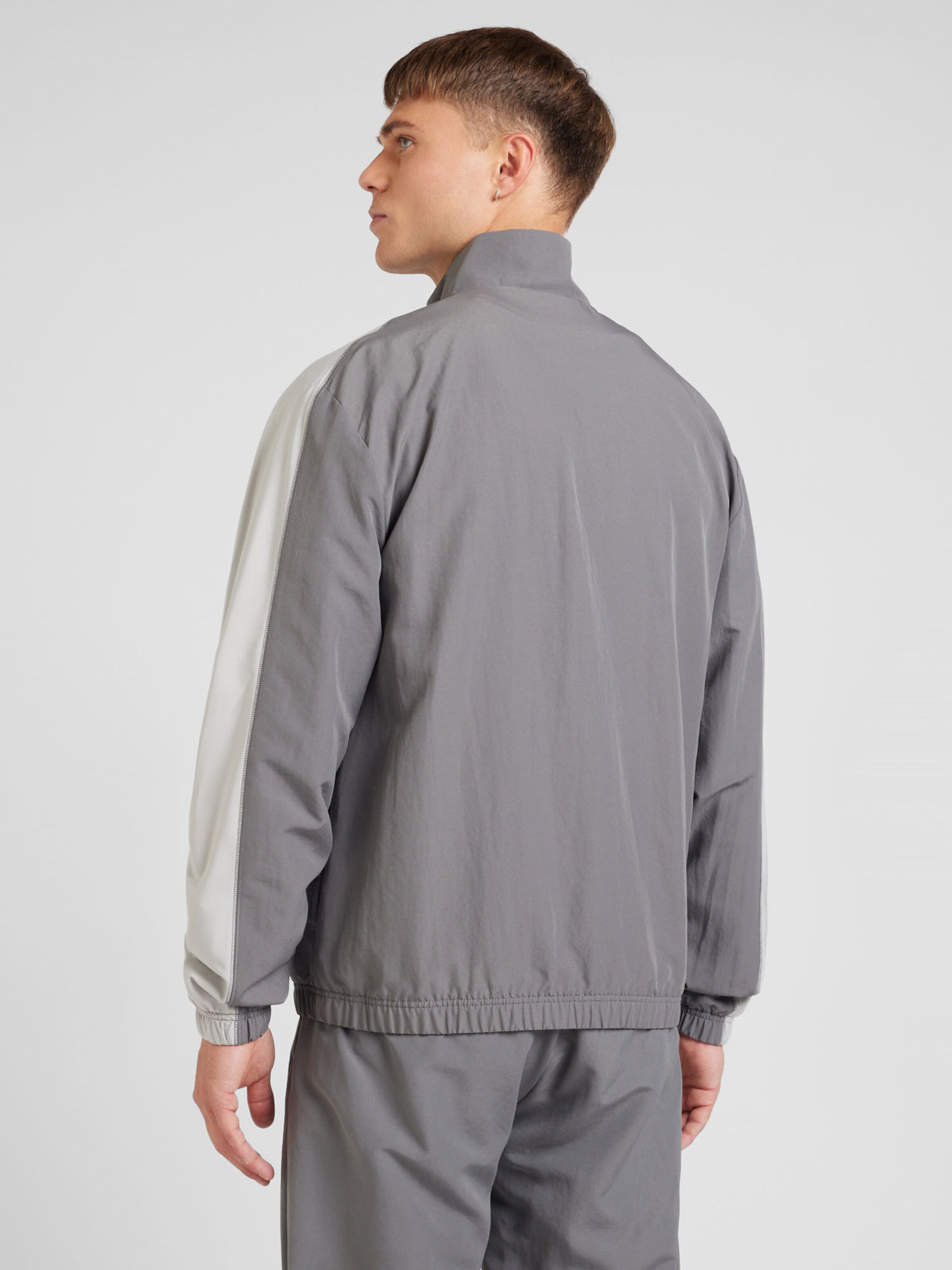 light grey adidas tracksuit