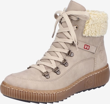 Bottines à lacets Rieker en beige : devant