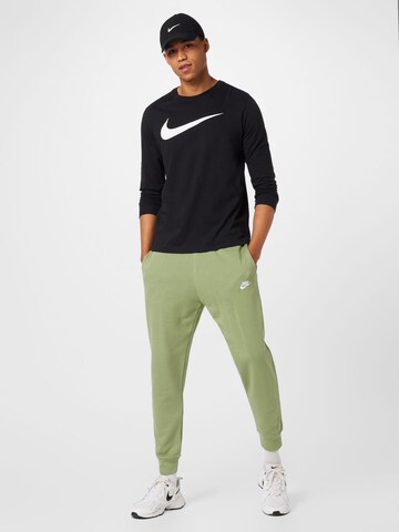 Nike Sportswear Tapered Hose in Grün