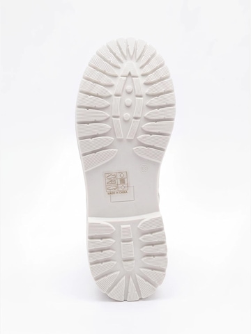TorWeit Booties 'Fluffy Lace Up Winter Boots' in White