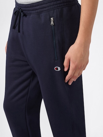 Champion Authentic Athletic Apparel Tapered Byxa i blå