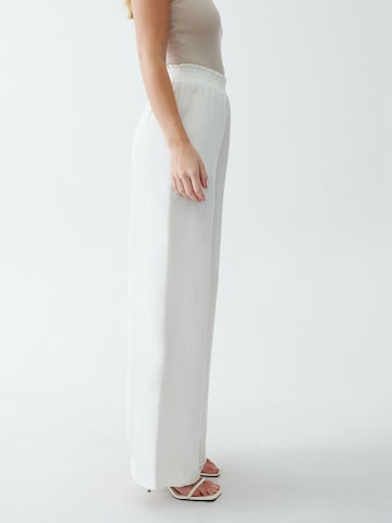 The Fated Wide leg Trousers in White: back
