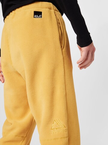 JACK WOLFSKIN Regular Workout Pants 'OSLOER' in Gold